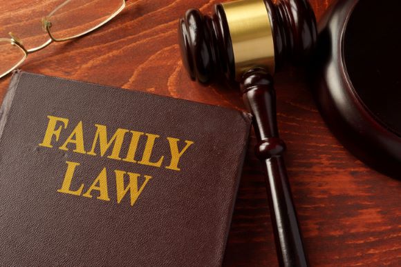 Book with title family law on a table